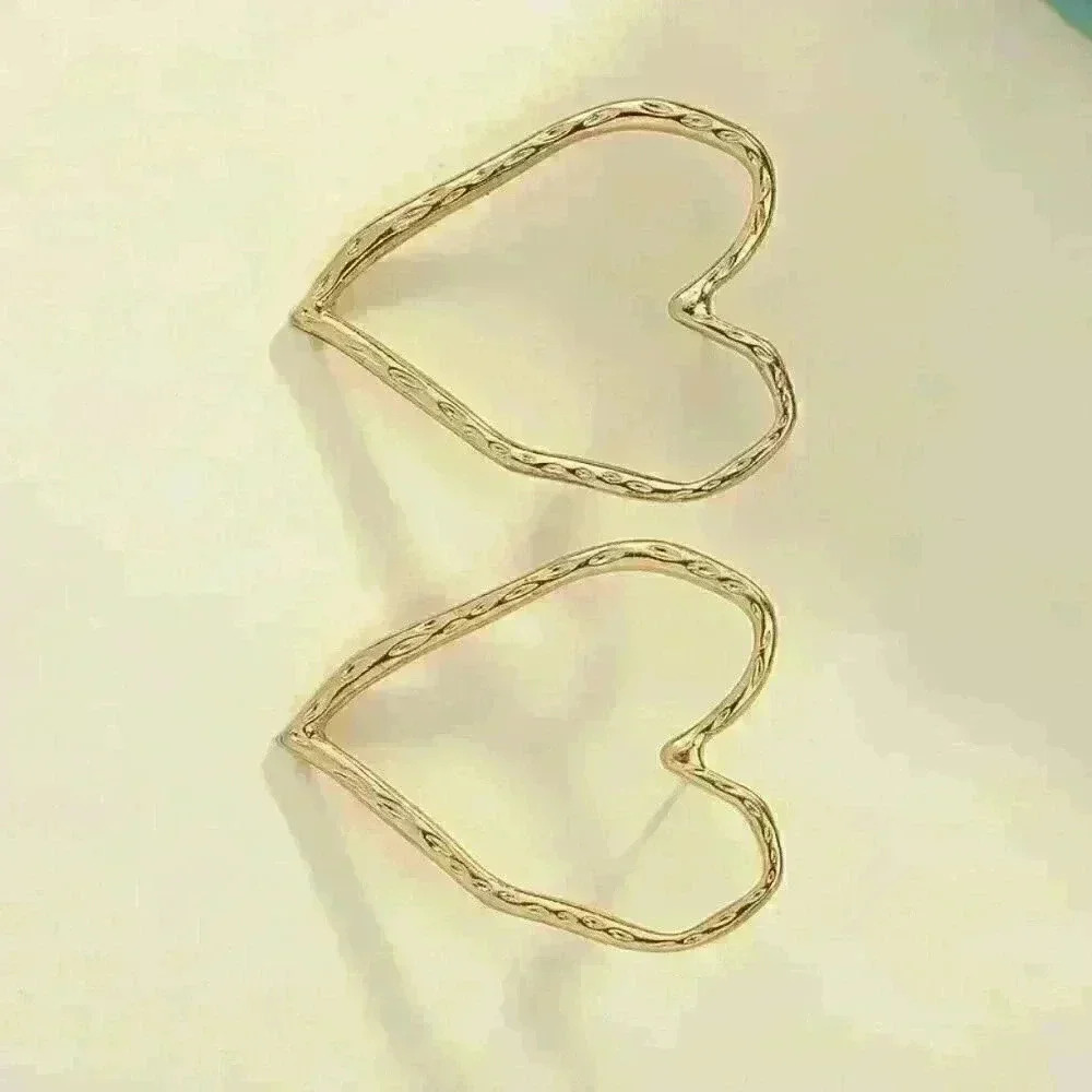 Hollow Heart Shaped Stud Earrings - Picture 3 of 5